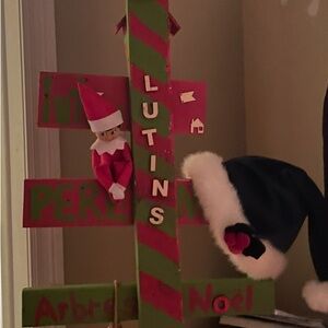 Festive Holiday Sign with Red and Green Accents